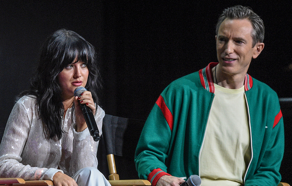 Markella Kavenagh, left, and Daniel Weyman speak on a panel for "The Lord of the Rings: The Rings of Power" during Comic-Con International on July 22, 2022, in San Diego. (AP/Invision/Richard Shotwell)